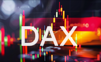 Eine Börsenkursanzeige mit dem Wort "DAX" und dem Deutschen Aktienindex im Hintergrund 