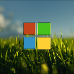 Ein Microsoft-Logo in einem grünen Grasfeld, mit einem blauen Himmel im Hintergrund