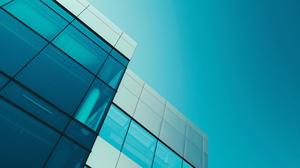 Siemens Healthineers Aktie: 370.000 Anteile zurückgekauft Das Siemens Healthineers-Logo an der Seite eines Gebäudes vor klarem Himmel
