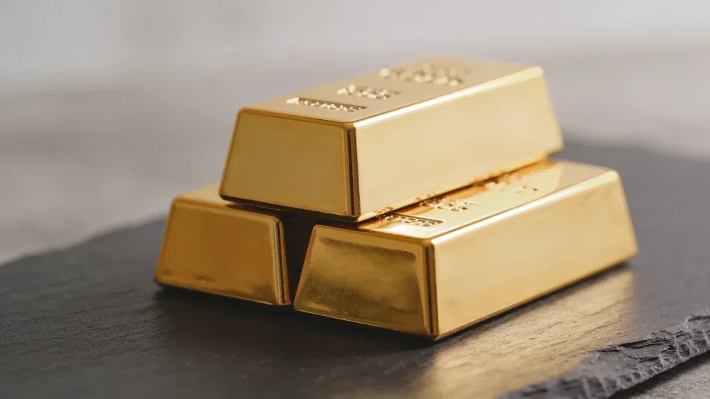 Gold: Der Dollar gibt nach, das Edelmetall zieht an Gold Aktie - Beitragsbild