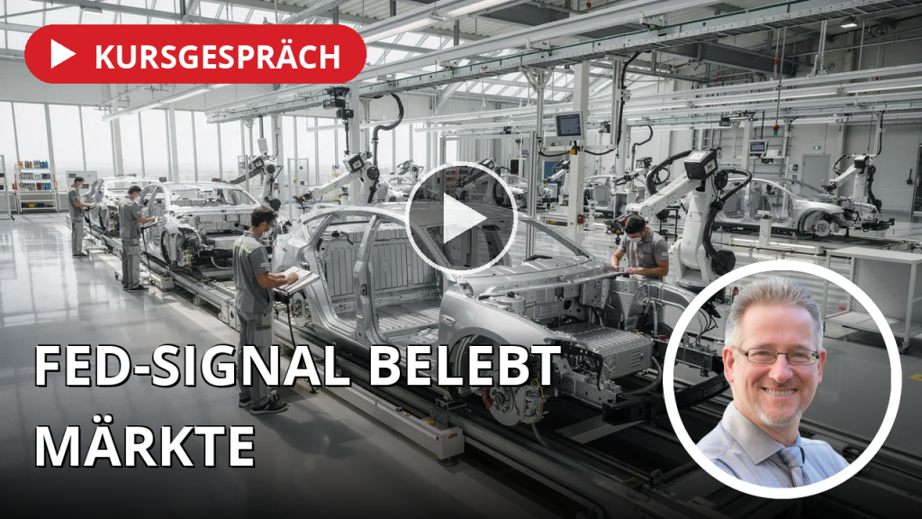 Fed-Signal sorgt für Erleichterung, Volkswagen zieht den Rotstift, Bayer zwischen Hoffnung und Realität Moderne Fertigungslinie in einem deutschen Automobilwerk mit Arbeitern bei der Montage eines Elektrofahrzeugs.
