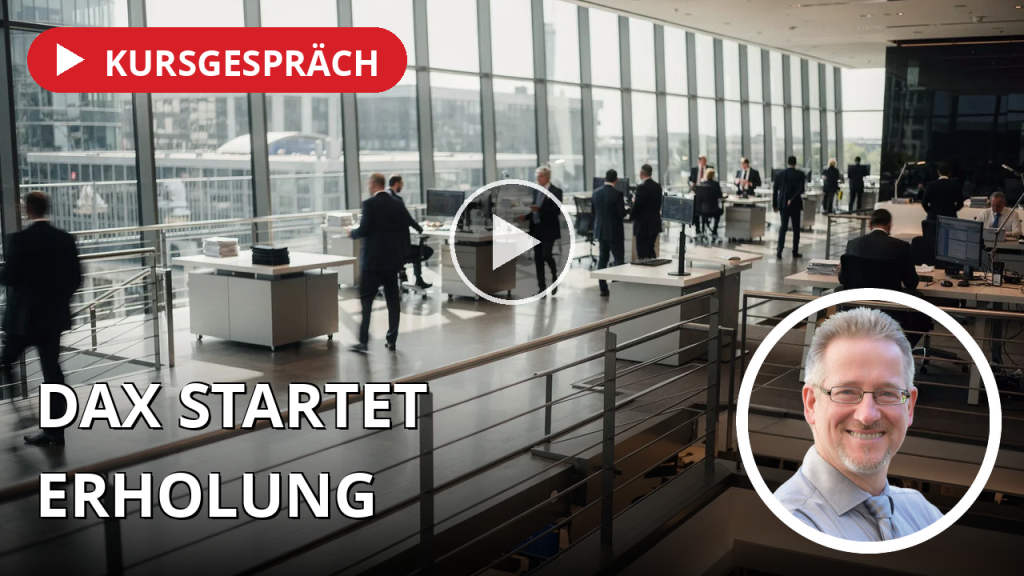 Betriebsames Parkett an der Frankfurter Börse mit unscharfen Personen in einem modernen, hellen Bürogebäude.